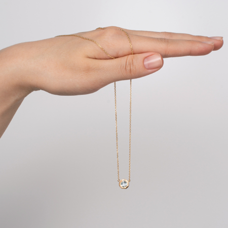 Золотое колье с топазом